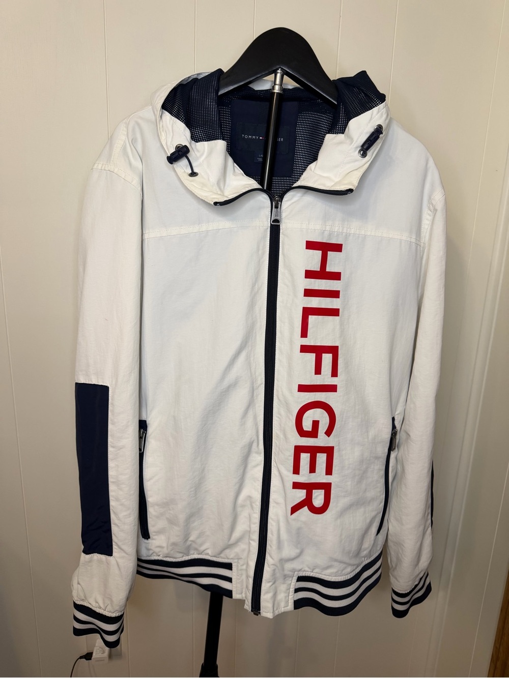 Tommy Hilfiger White Windbreaker Jacket with Red Vertical Logo and Navy Trim